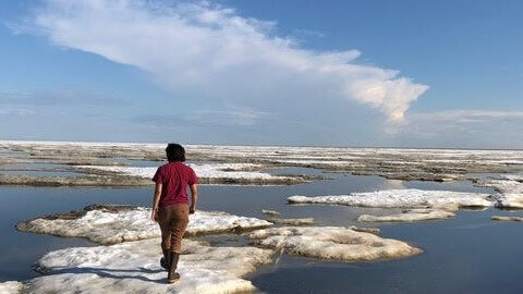 Christina Bonsell walks on broken ice